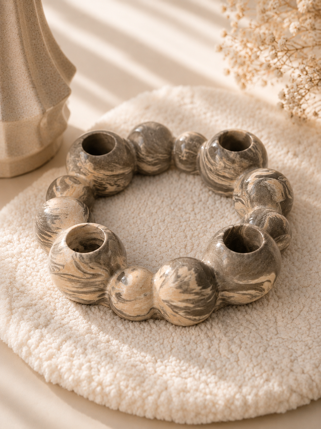 One of our favourite décor pieces.  A handcrafted marbled candle holder designed to bring warmth and style, Elegant • Versatile • Beautiful