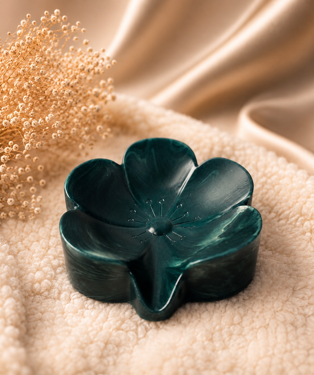 A stunning flower-shaped trinket holder with a beautiful marbled finish  Perfect for holding jewellery, crystals or little treasures A gorgeous touch of luxury for any space