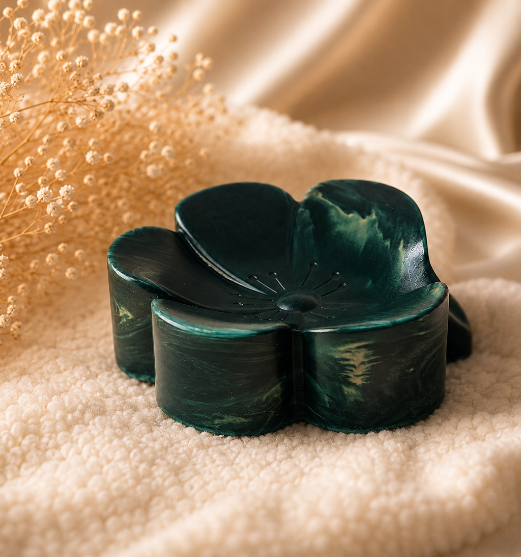 A stunning flower-shaped trinket holder with a beautiful marbled finish  Perfect for holding jewellery, crystals or little treasures A gorgeous touch of luxury for any space